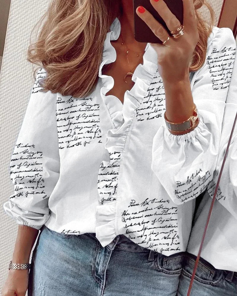  Female in a lightweight blouse with gathered details and balloon sleeve styling. 