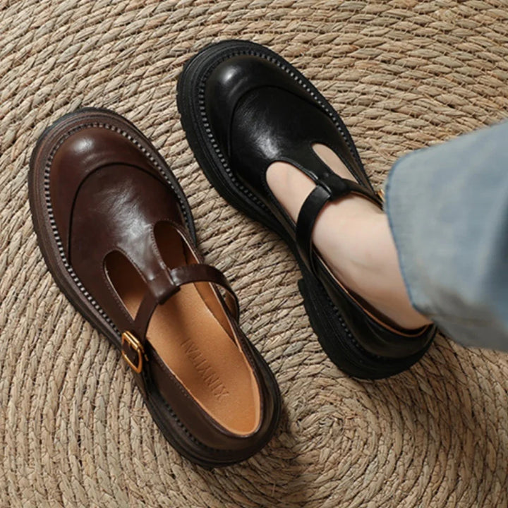 Women’s mid-height block heel pumps shown on a plain background.