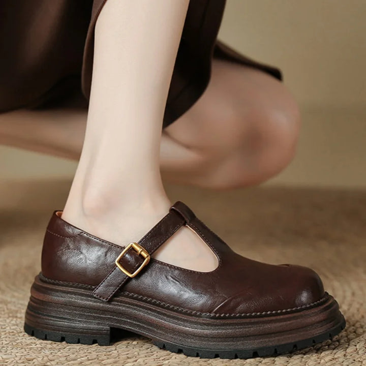 Women’s sleek pointed toe pumps displayed on a plain background.