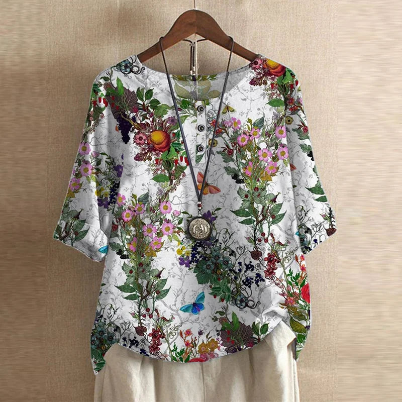 A long sleeve floral blouse suitable for casual and smart occasions.X.