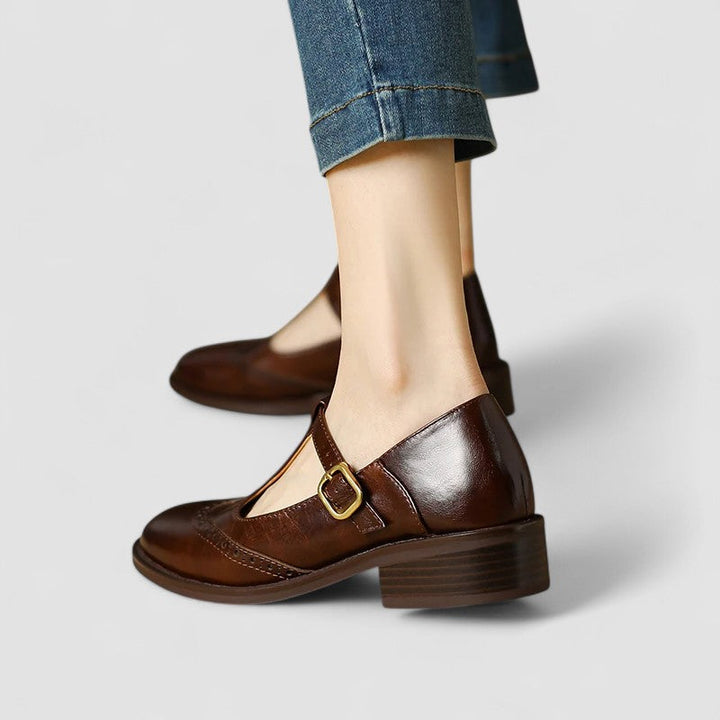 Women’s strap shoes shown on a plain background with a clean everyday design.