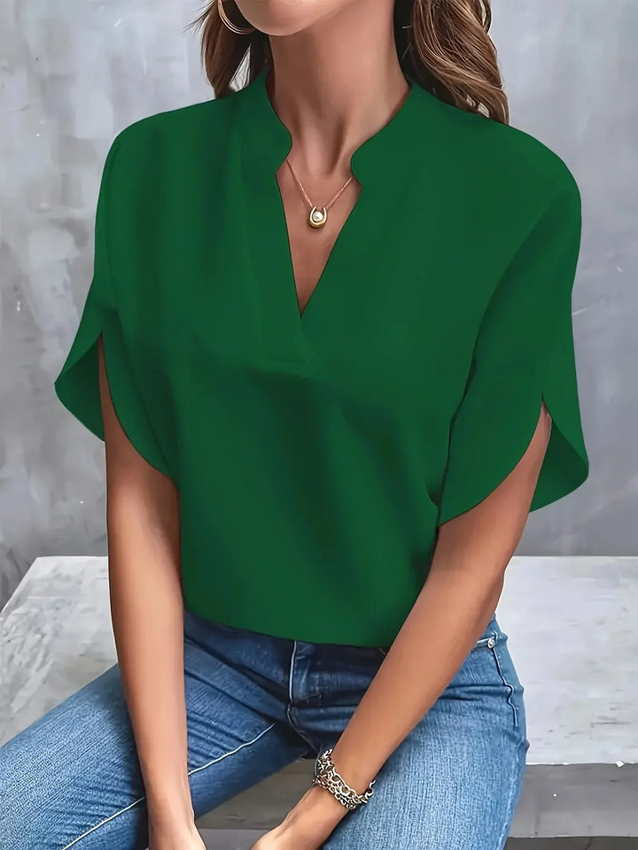  Woman wearing a versatile blouse suitable for everyday styling.