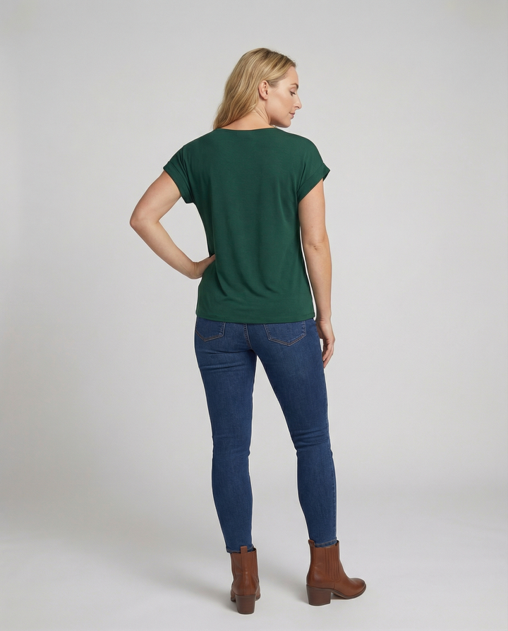 Female wearing a classic V-neck blouse with elegant everyday styling.