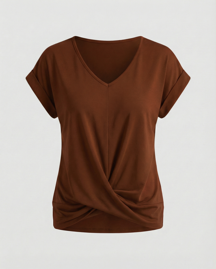 Lightweight blouse paired with tailored bottoms.