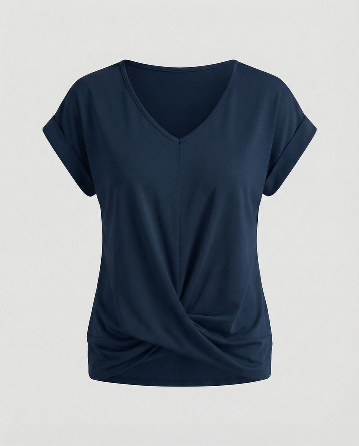 Short sleeve V-neck top against a plain background.