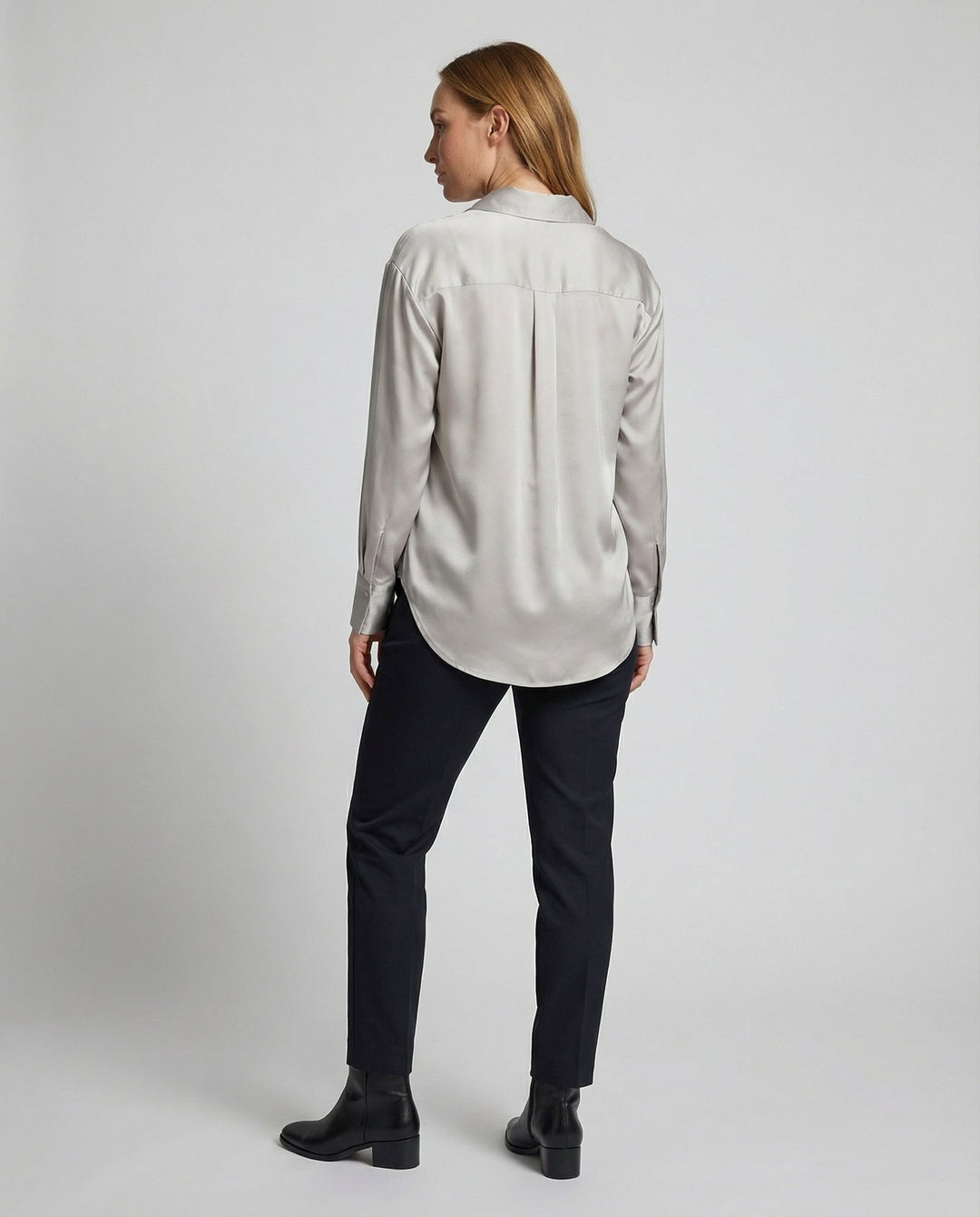 Classic silk blouse styled for everyday elegance.