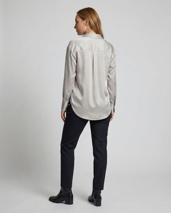 Classic silk blouse styled for everyday elegance.