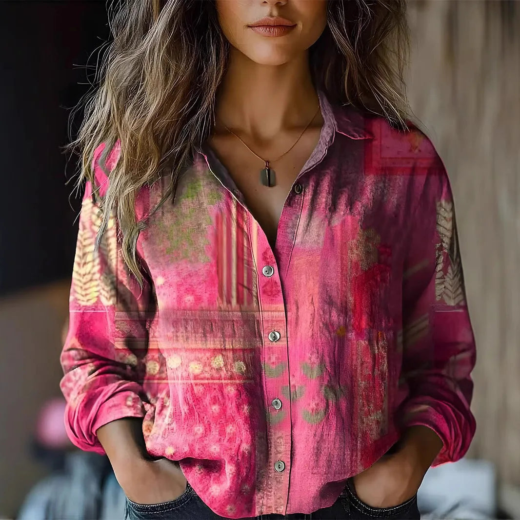  Woman modelling a long sleeve floral shirt with a relaxed fit.