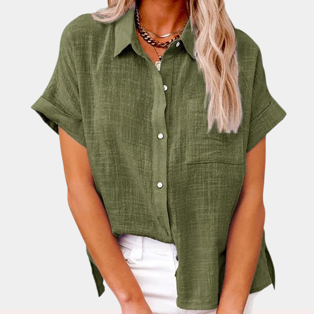  Female modelling a lightweight striped blouse with long sleeves on a plain background.