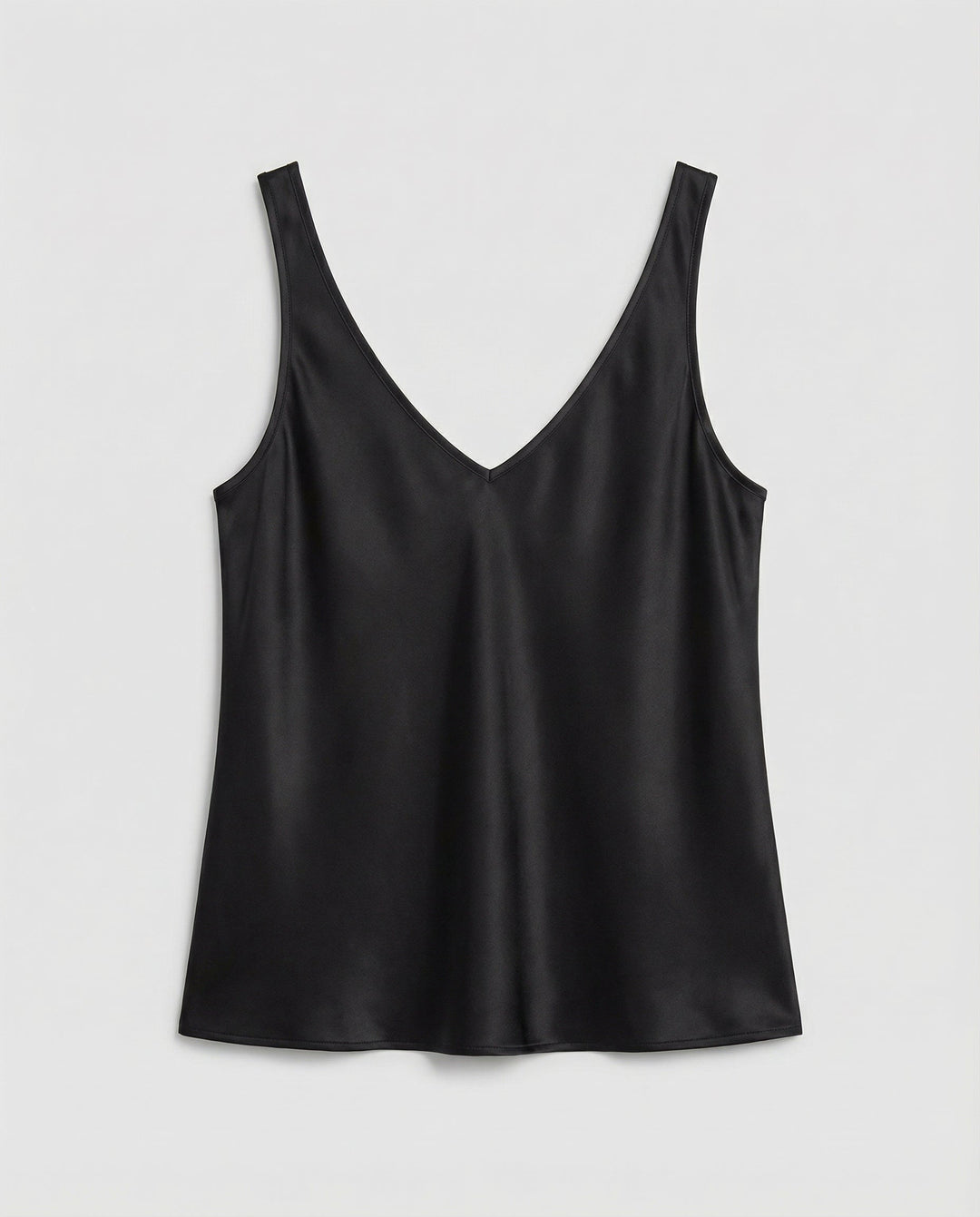 Lightweight silk top designed for warm weather wear.
