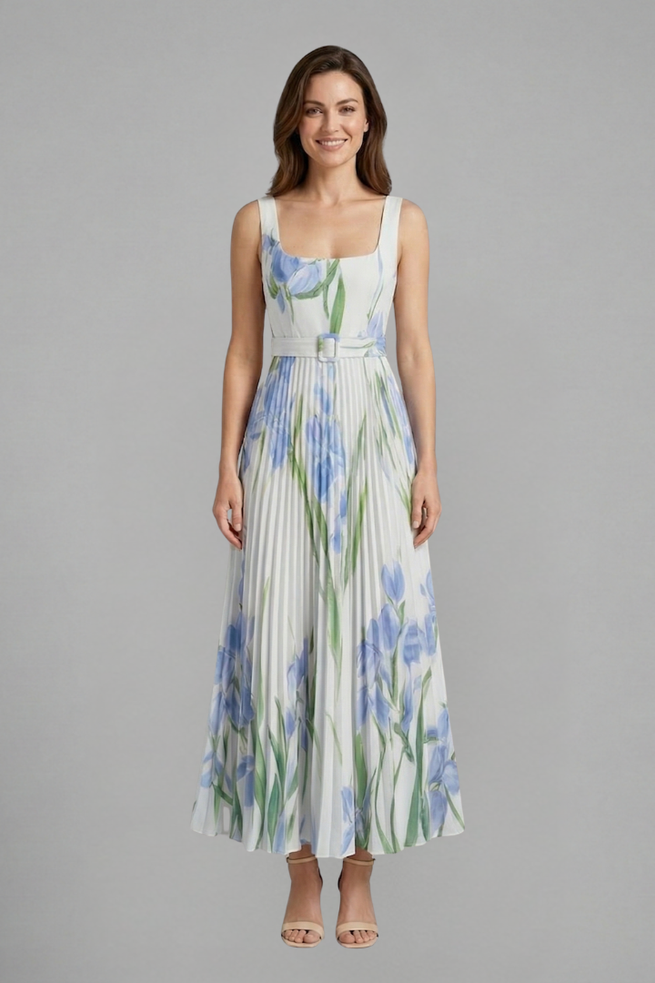 Female model in a sleeveless maxi dress featuring a square neckline and textured floral pattern.
