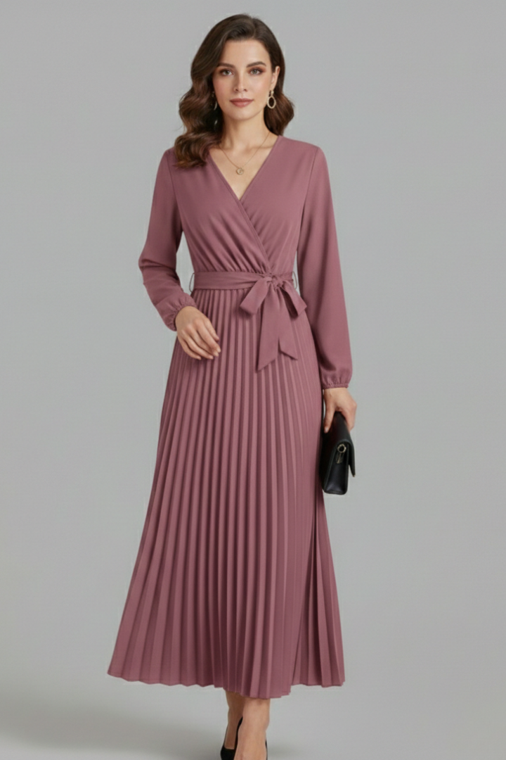 Female model showcasing a flowing maxi dress suitable for formal and casual occasions.