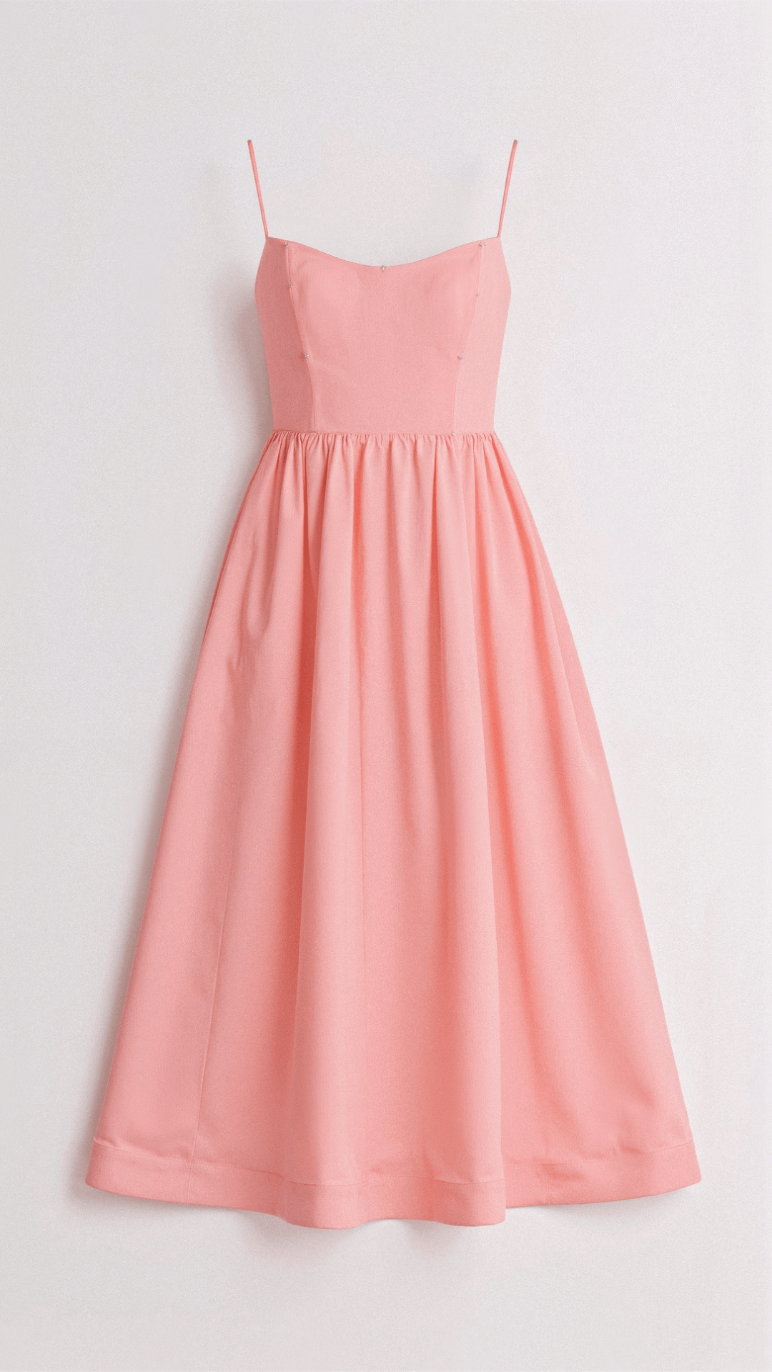 Casual midi dress with feminine shoulder straps.