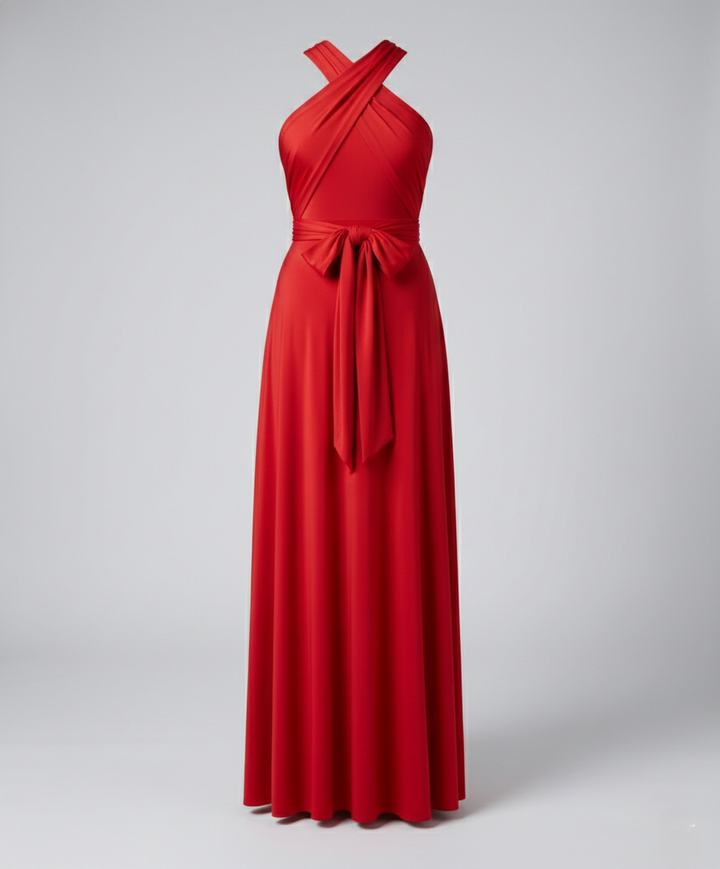 Deep V-neck maxi dress with draped fabric on a plain background.

