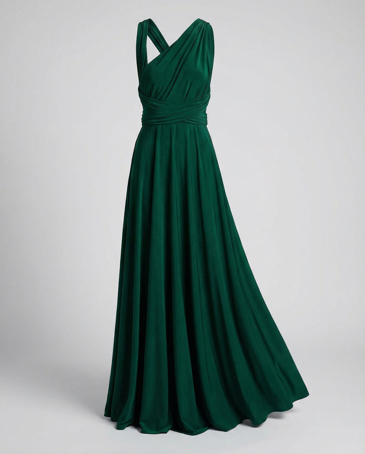 Versatile wrap dress with long fabric ties on a plain background.
