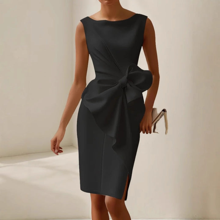 Female showcasing a sleeveless formal midi dress with structured silhouette against a plain background.