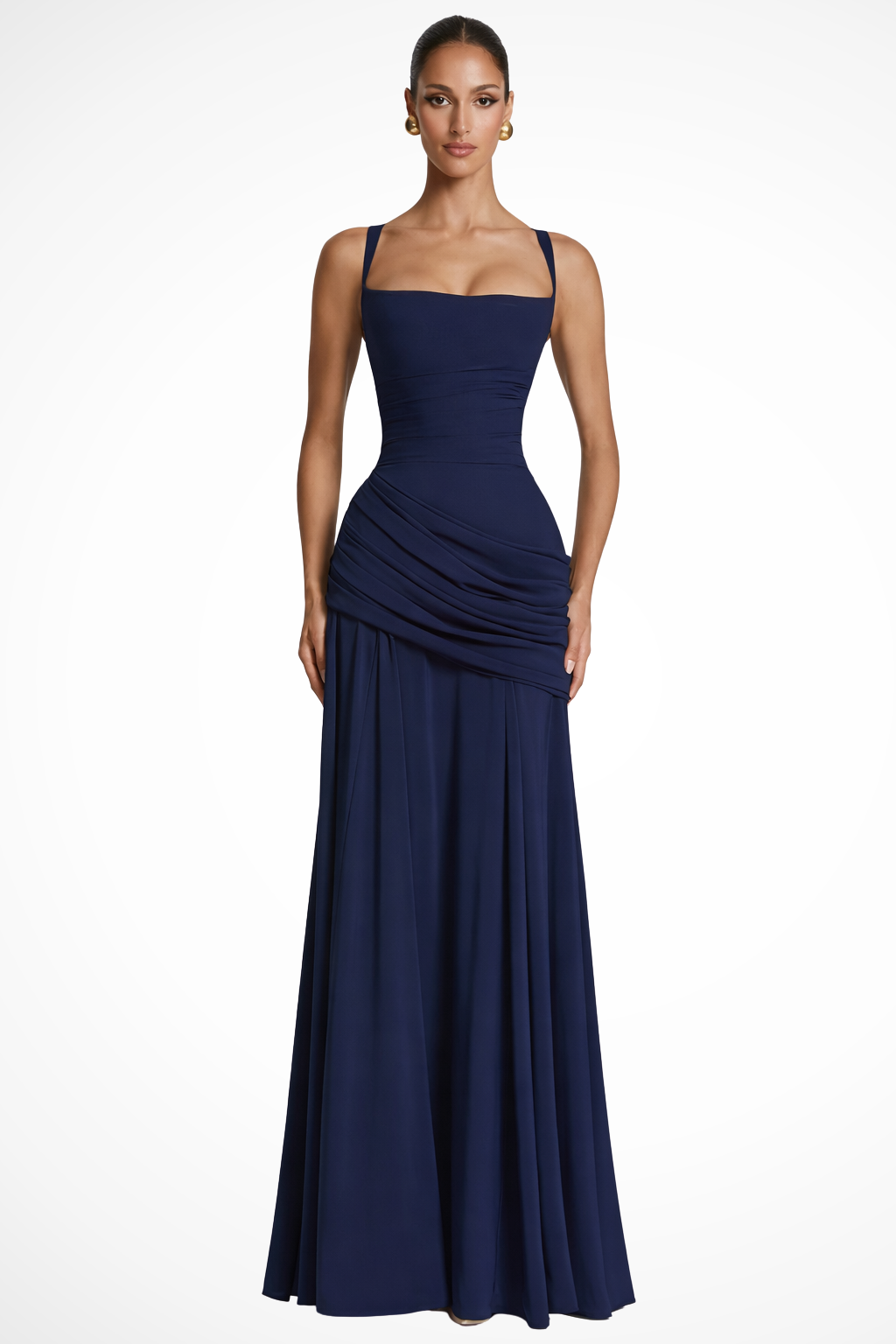 Model posing in a sleeveless square neckline evening gown on a plain background.