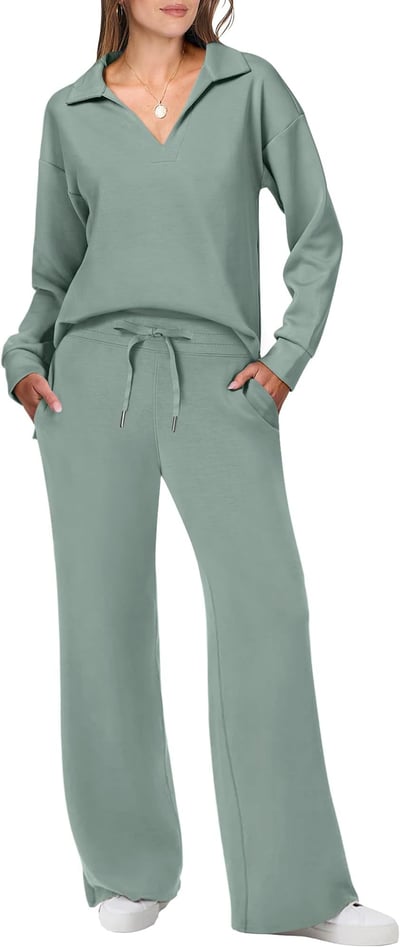 Woman modelling a sleek jogging suit set with clean silhouette.