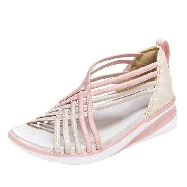 Everyday walking sandals on a plain background.