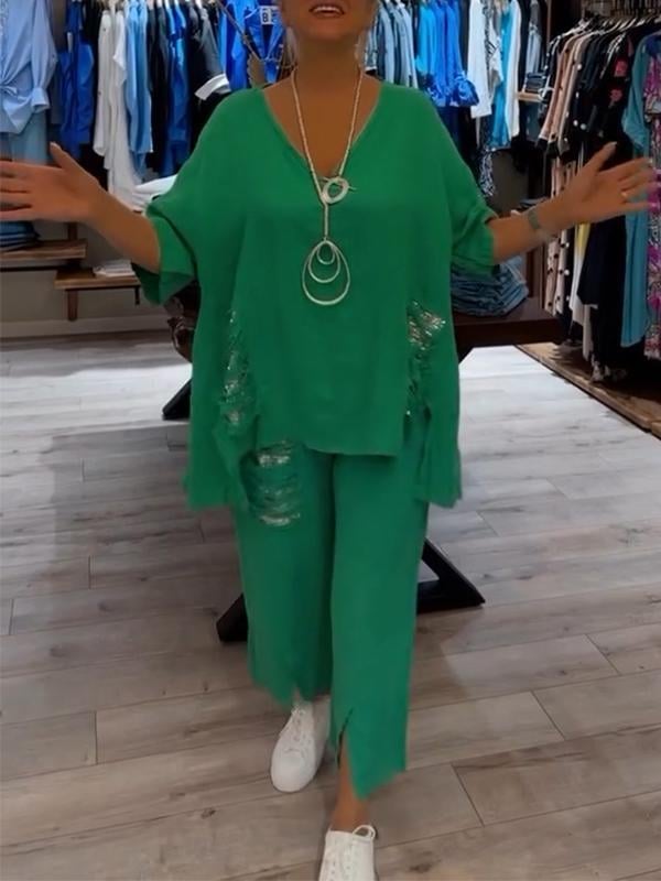 Woman styled in a matching co-ord set designed for warm-weather occasions.