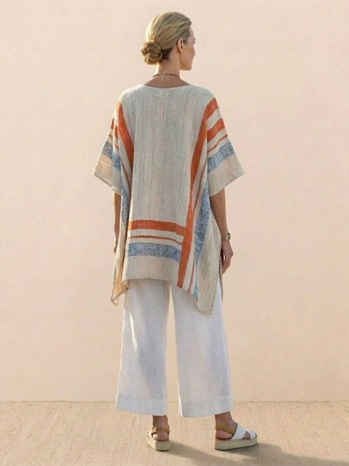 Female model in a matching striped outfit designed for holidays and casual gatherings.