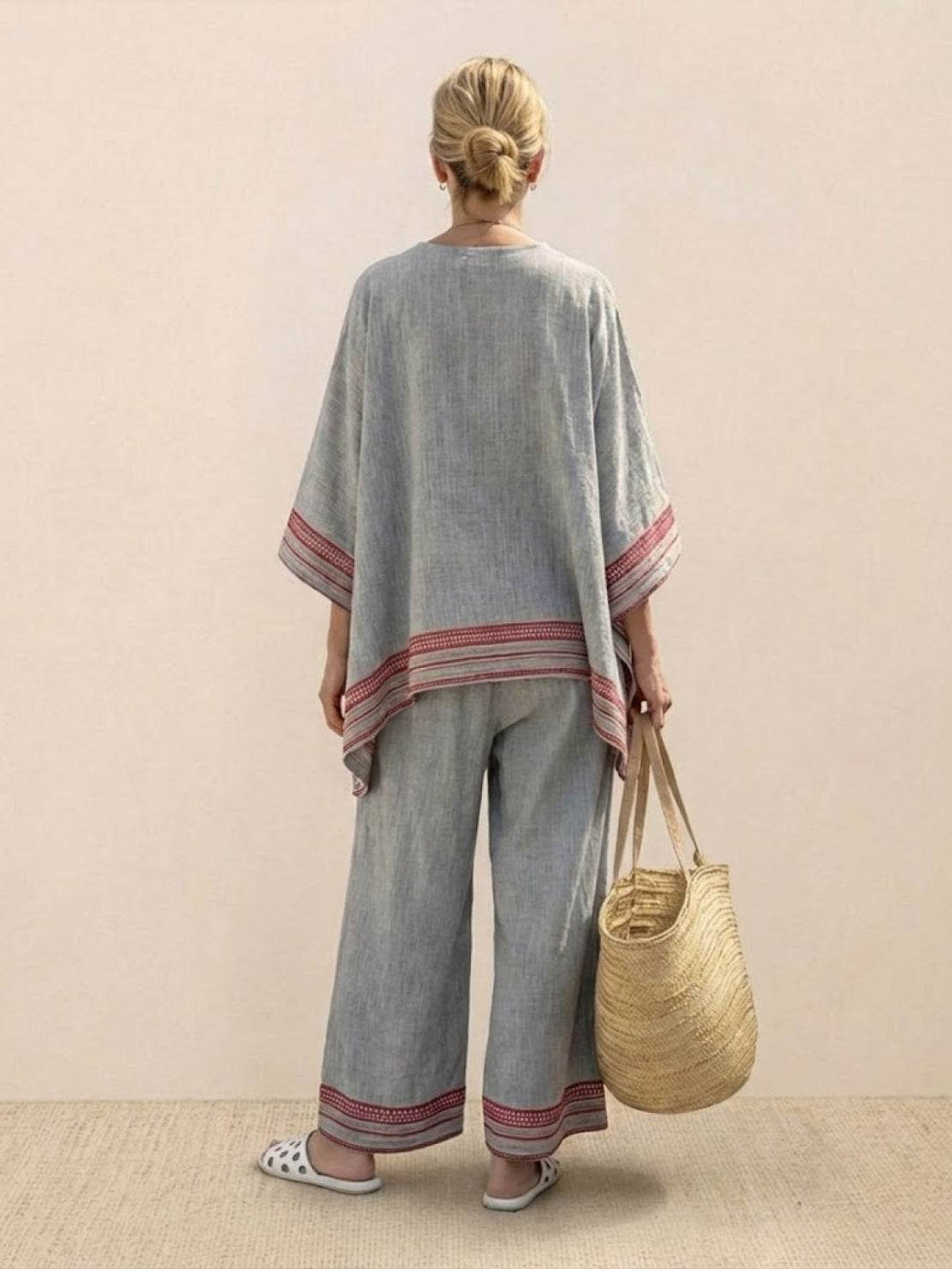 Female model wearing a coordinated embroidered outfit suitable for casual and smart-casual events.
