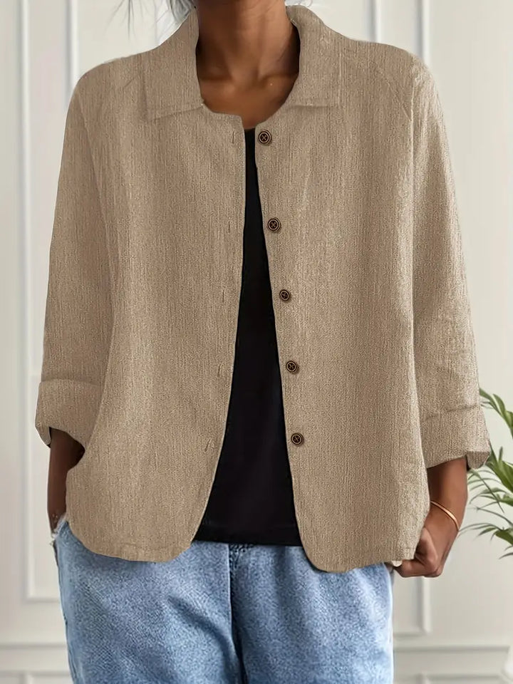  Woman in a classic casual layering top with a relaxed silhouette.