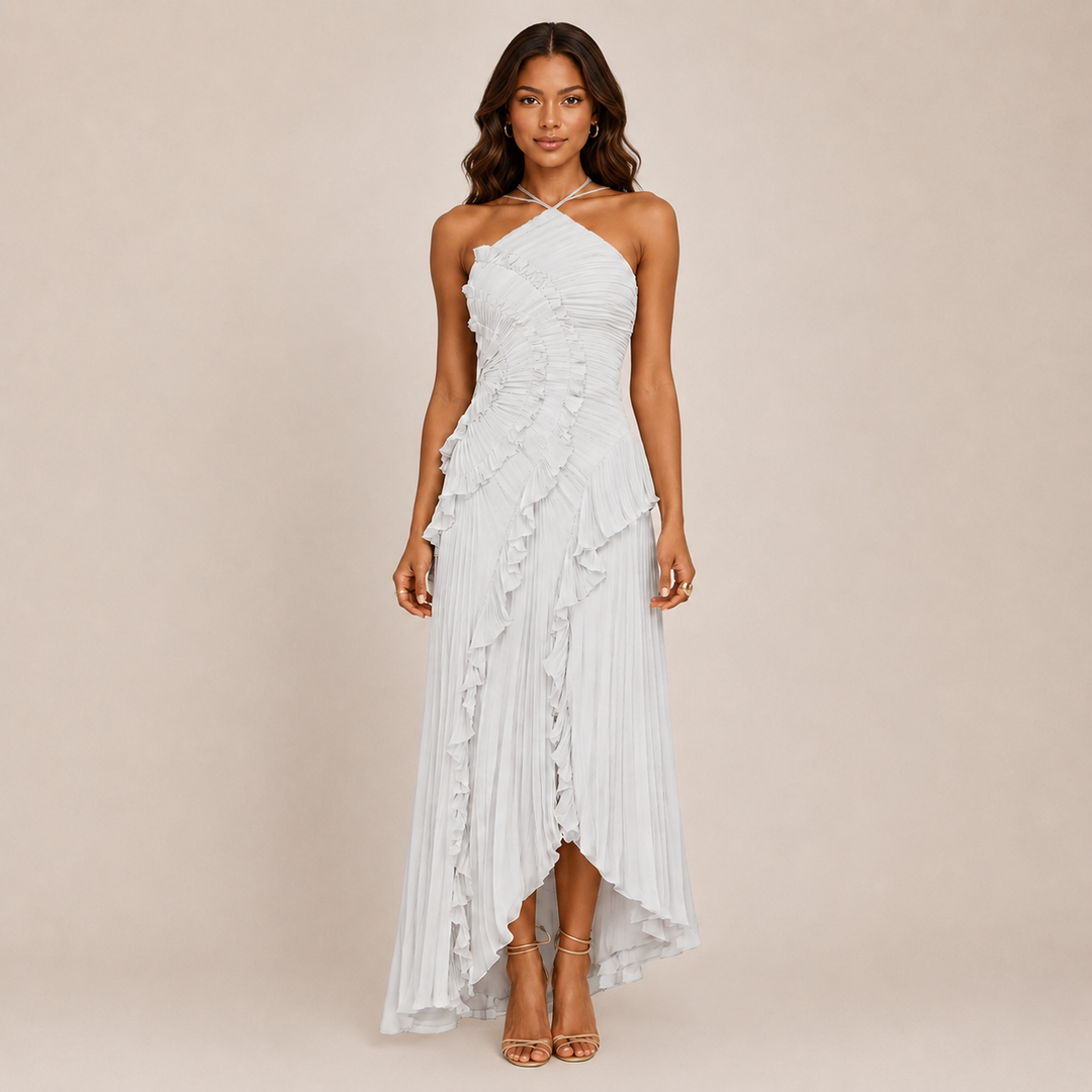 Female in a lightweight A-line party dress standing on a plain background.