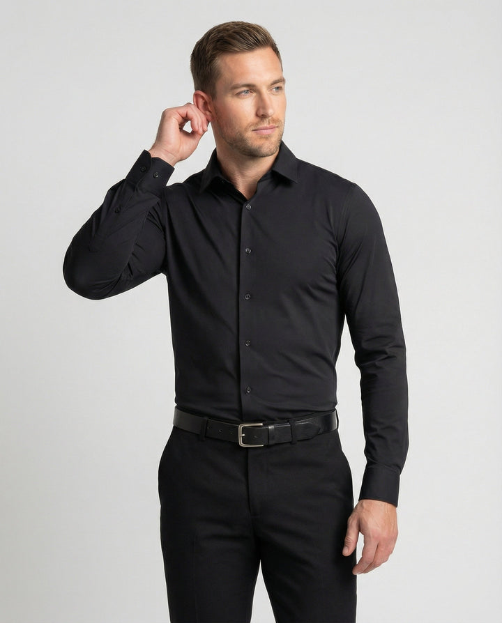 Male model wearing a fitted stretch business shirt against a plain background.