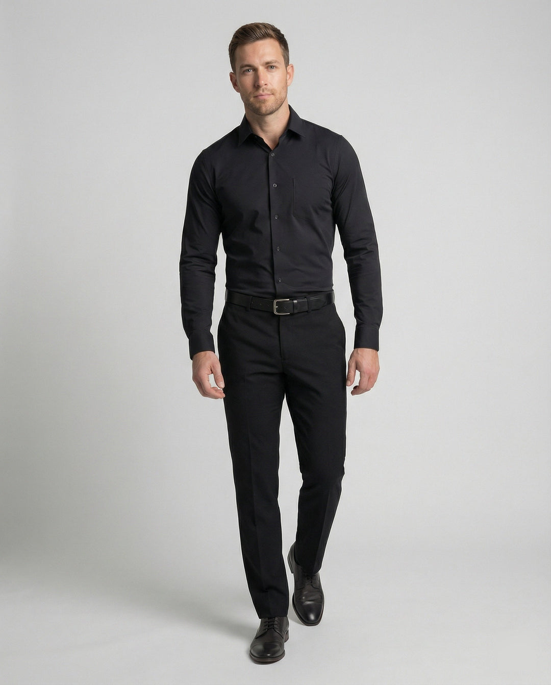 Man in a long sleeve business shirt with a modern tailored fit.