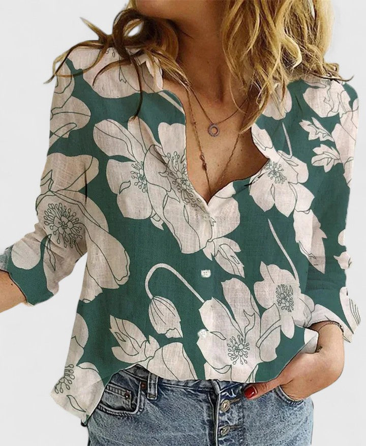  Female wearing a versatile long sleeve shirt on a plain background.