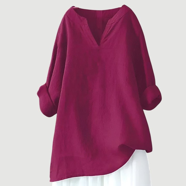 A loose-fitting casual top designed for warm-weather wear.