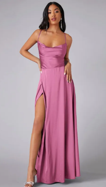 Model showing a cowl neck evening dress with fitted waist.