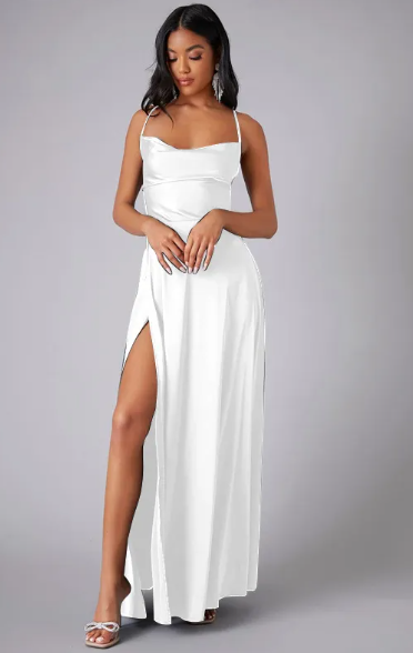 Woman in a draped neckline maxi dress styled for evening occasions.