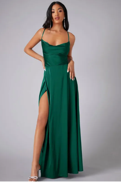 Model wearing an elegant evening maxi dress with lace-up back detail.