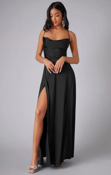 Model wearing a floor-length women’s event dress with lace-up back.