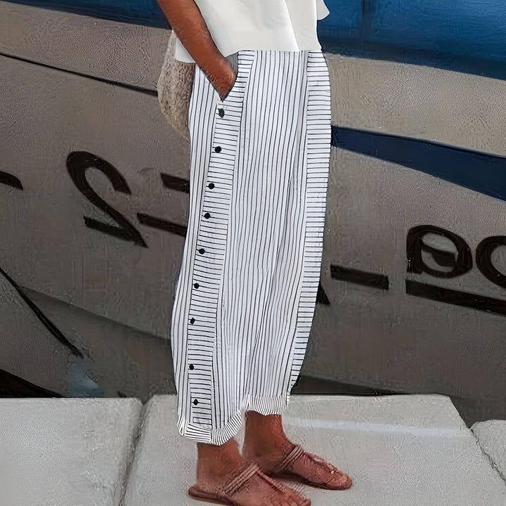  Woman in casual striped trousers designed for everyday wear.