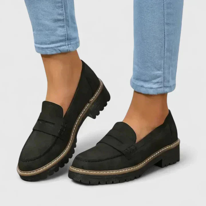 Women’s slip-on loafers shown on a plain background with a clean everyday style.