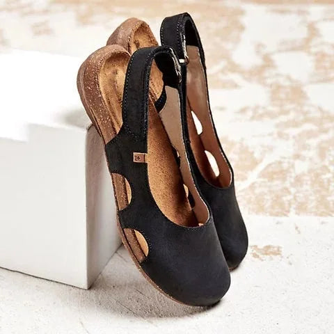 Open toe sandals styled for everyday wear on a plain background.