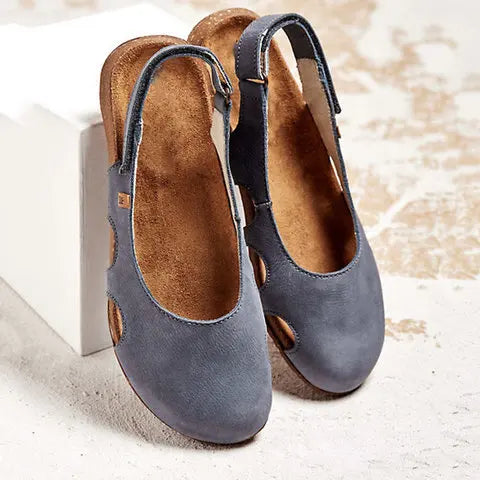 Casual sandals on a plain background.