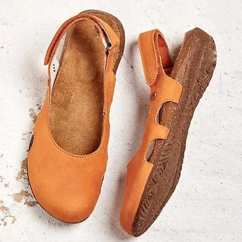 Lightweight walking sandals with a plain background.