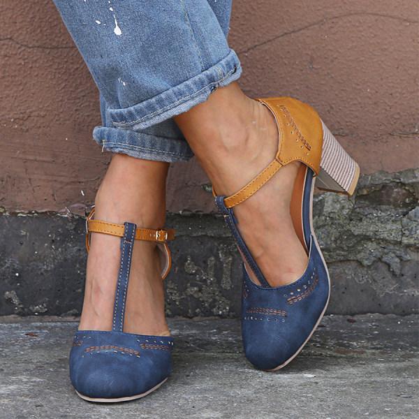 Classic women’s heeled shoes displayed on a plain background for smart outfit styling.