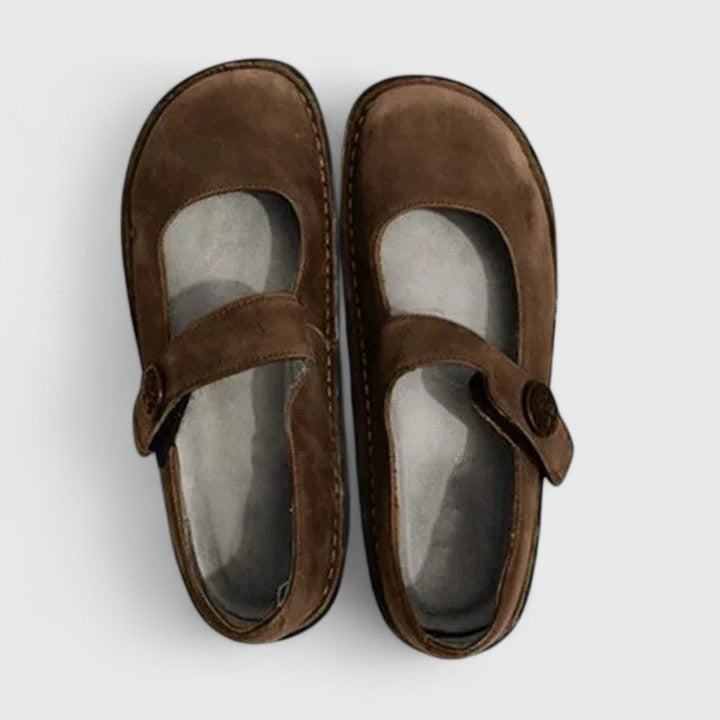 Classic comfort footwear on a plain background.