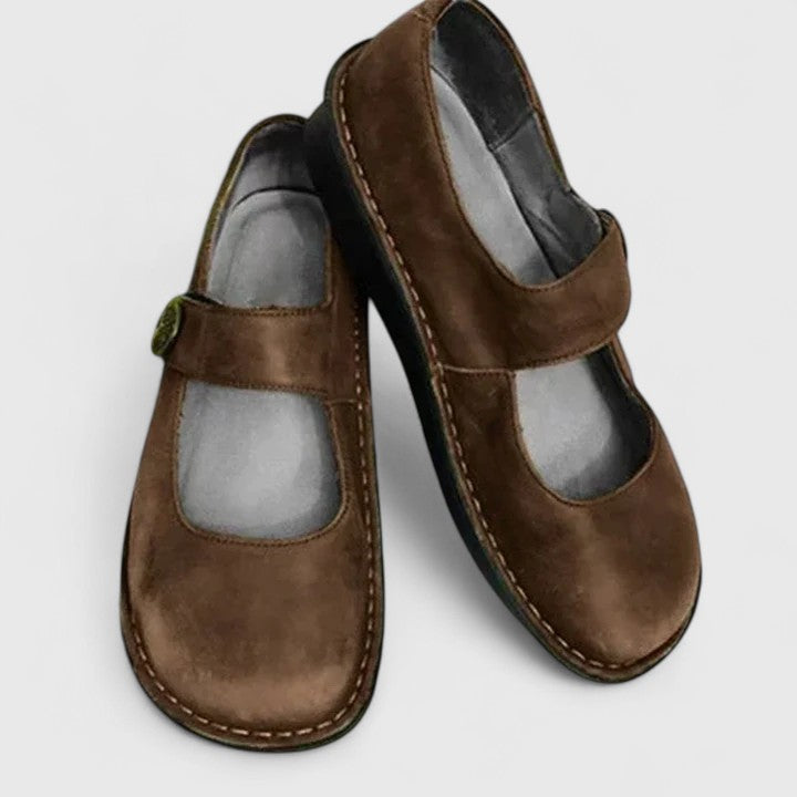Showcasing stylish everyday shoes on a plain background.