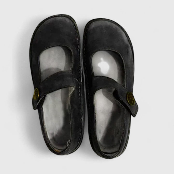 Flexible everyday footwear on a plain background.