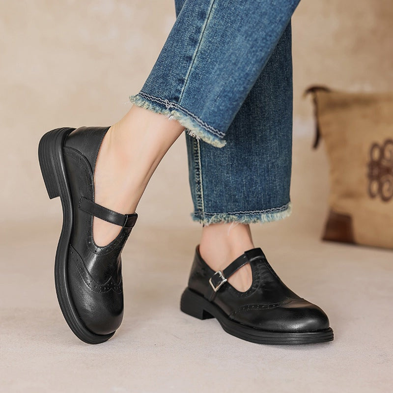 Female model posing in casual strap sandals against a plain background.