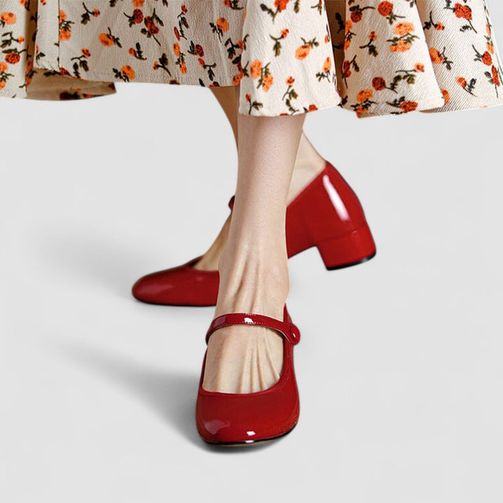 Polished women’s shoes with a clean silhouette on a plain background.
