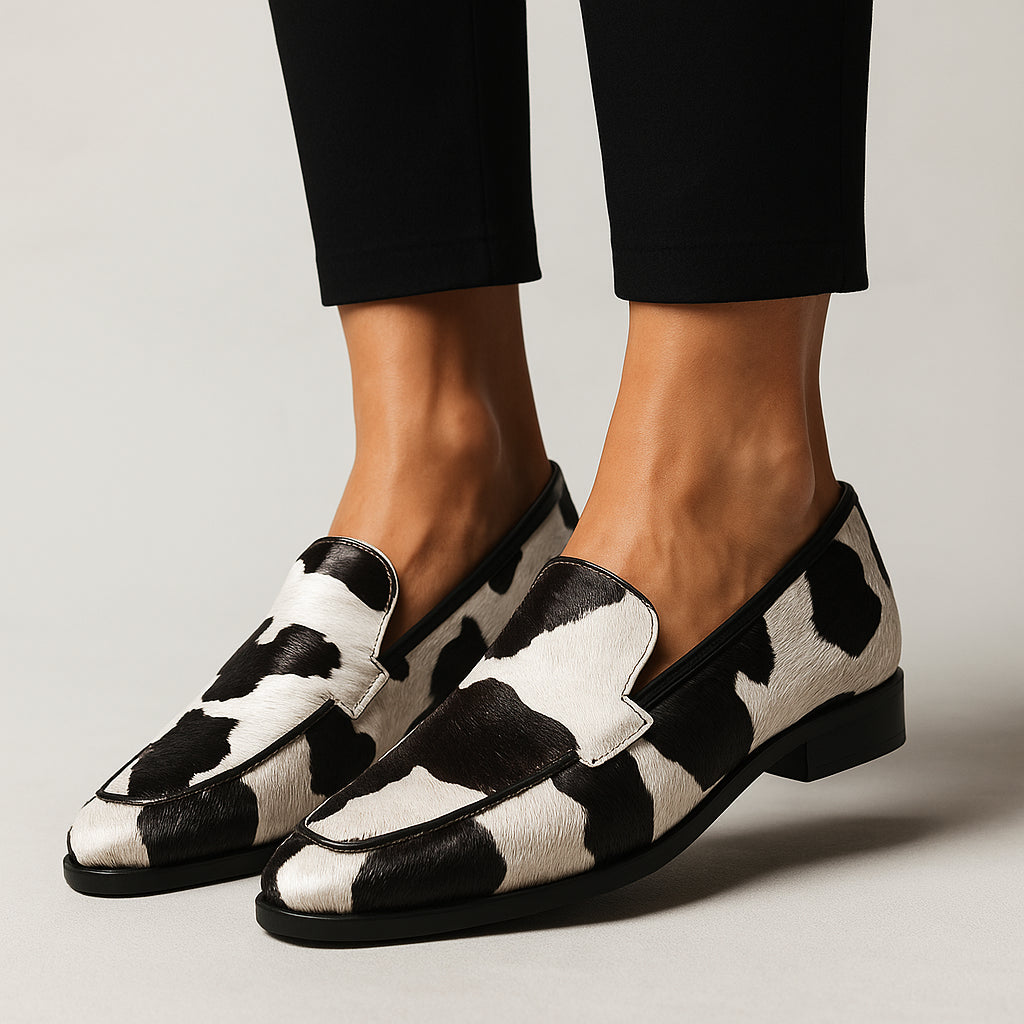 Nicodema | Women's Orthopedic Comfort Slip-On Classic Cow Print Loafers with Slip On Design — White