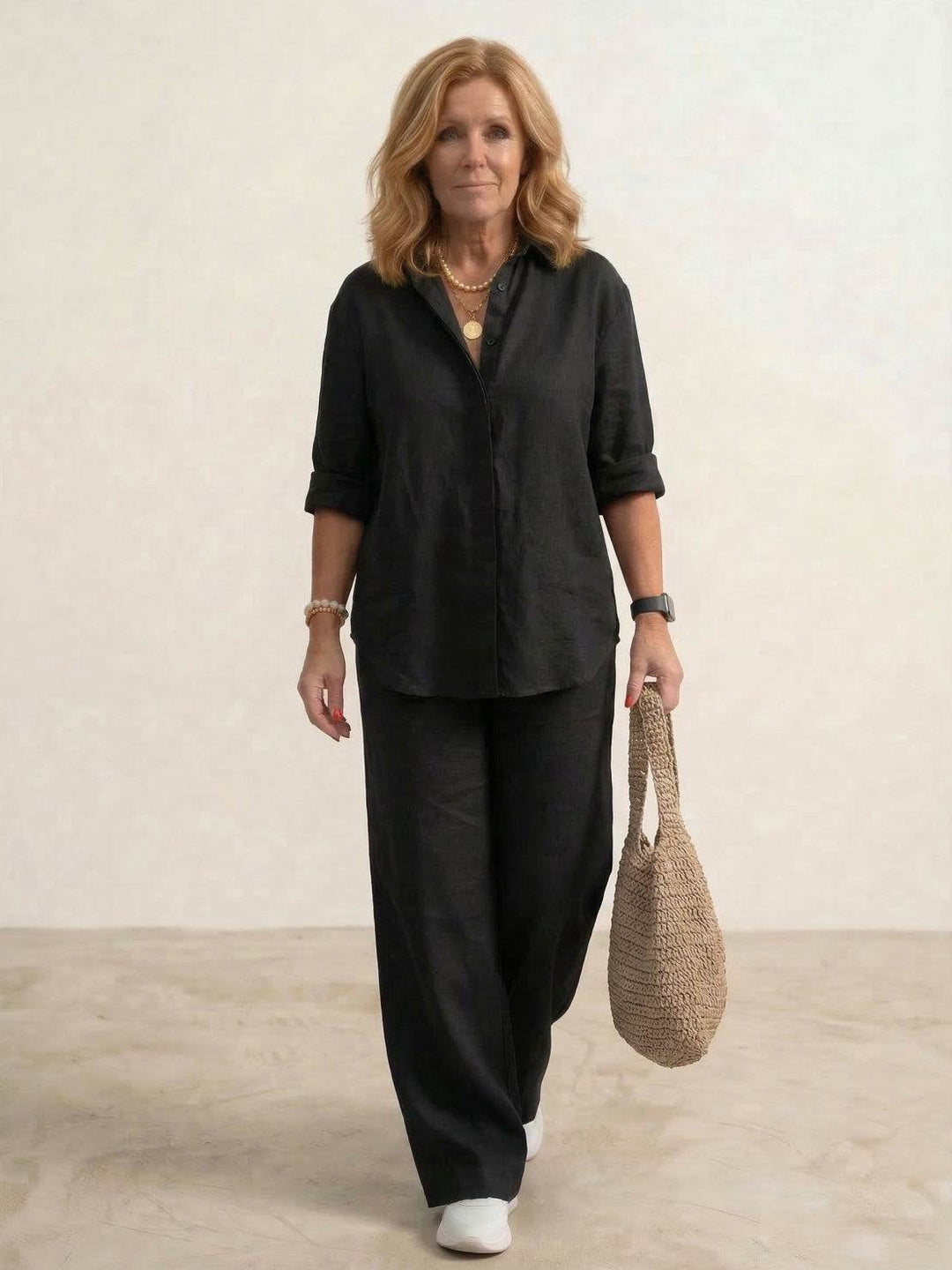 Woman showcasing a relaxed-fit co-ord set with an oversized button-up shirt..