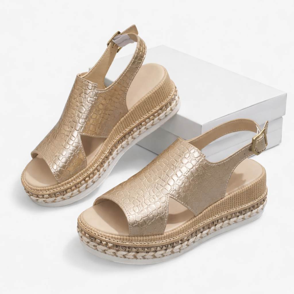 Casual summer wedge sandals with a cushioned footbed on a plain background.
